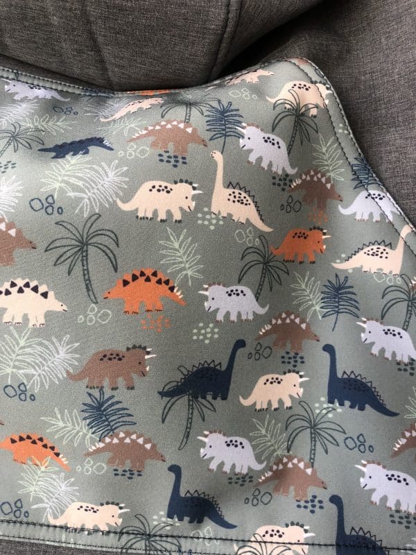 Cobertor universal de porteo Dinosaurios Gris