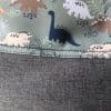 Cobertor universal de porteo Dinosaurios Gris
